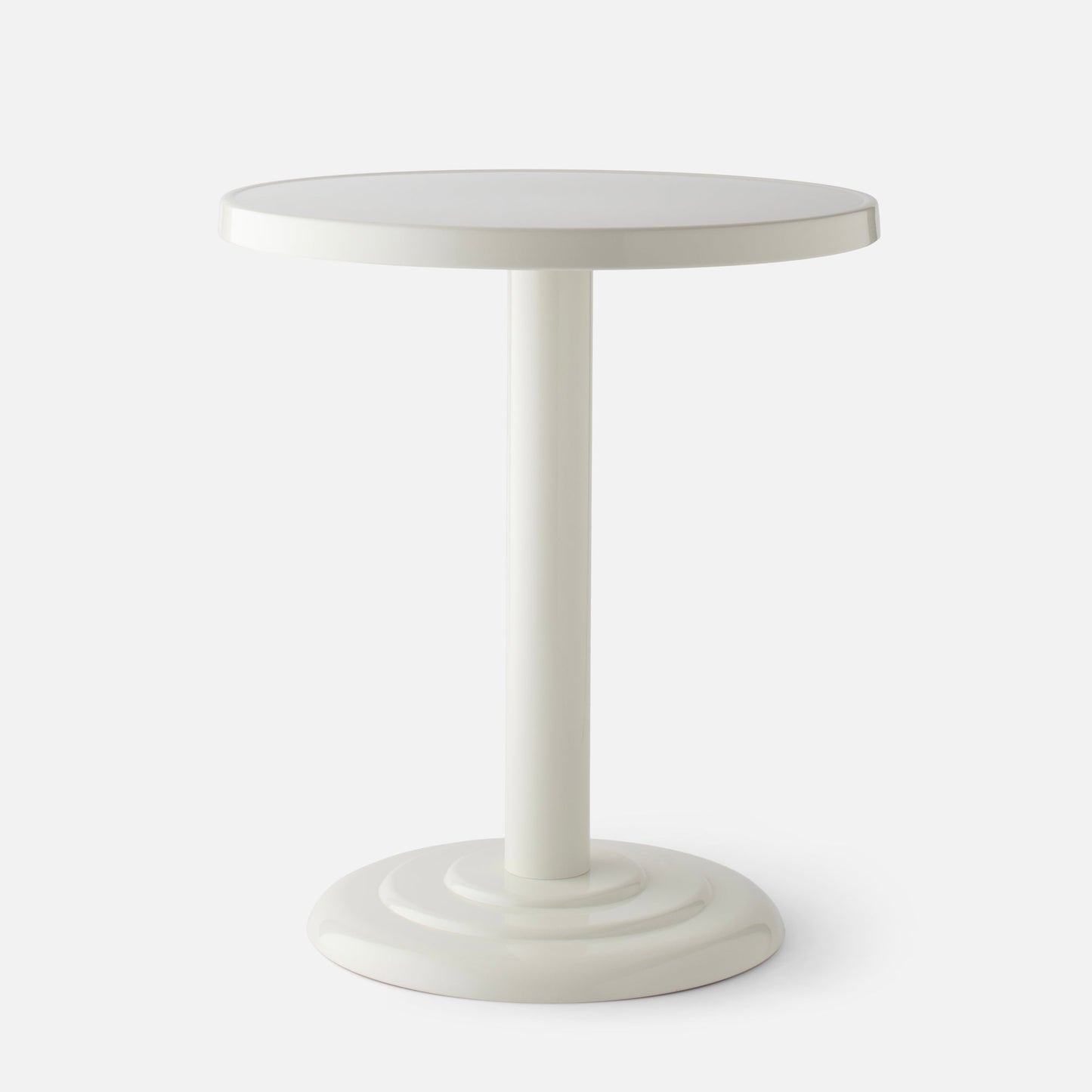 Front close-up of Owen Bistro Table showing round top and pedestal base in shell white gloss on light gray background