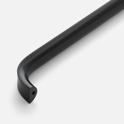 Angled close-up of Cascade Appliance Pull showcasing its curved black bar and mounting end on a white background