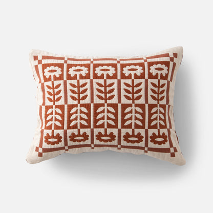 Front view of Stillwater Floral Sham showcasing rust floral block applique on natural cotton, photographed on white background