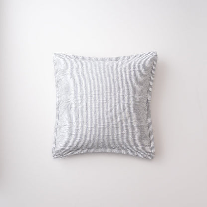 Front view of Diamond Ticking Quilted Pillow Sham showing narrow gray ticking stripes and diamond quilting on a white background