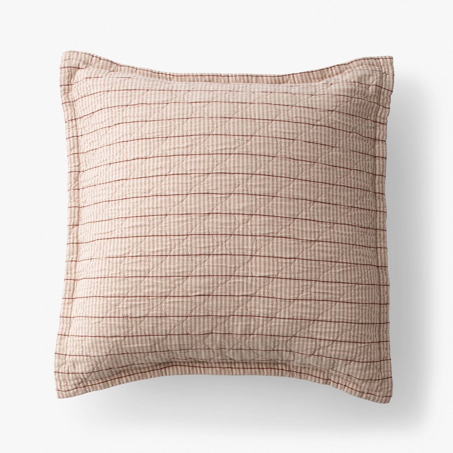 Overhead of Diamond Ticking Quilted Pillow Sham showing narrow pink and cream ticking stripes and horizontal quilting